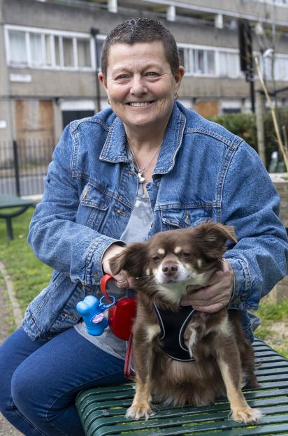 Kelly and her dog, Buster, at the Aylesbury Estate in Walworth, South London.
