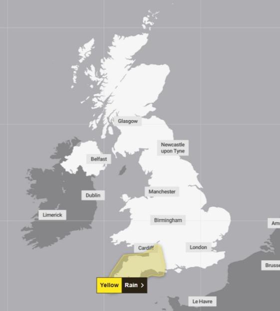 Weather map of the UK and Ireland showing a yellow rain warning issued by the Met Office, covering Cardiff and surrounding areas in southern Wales.