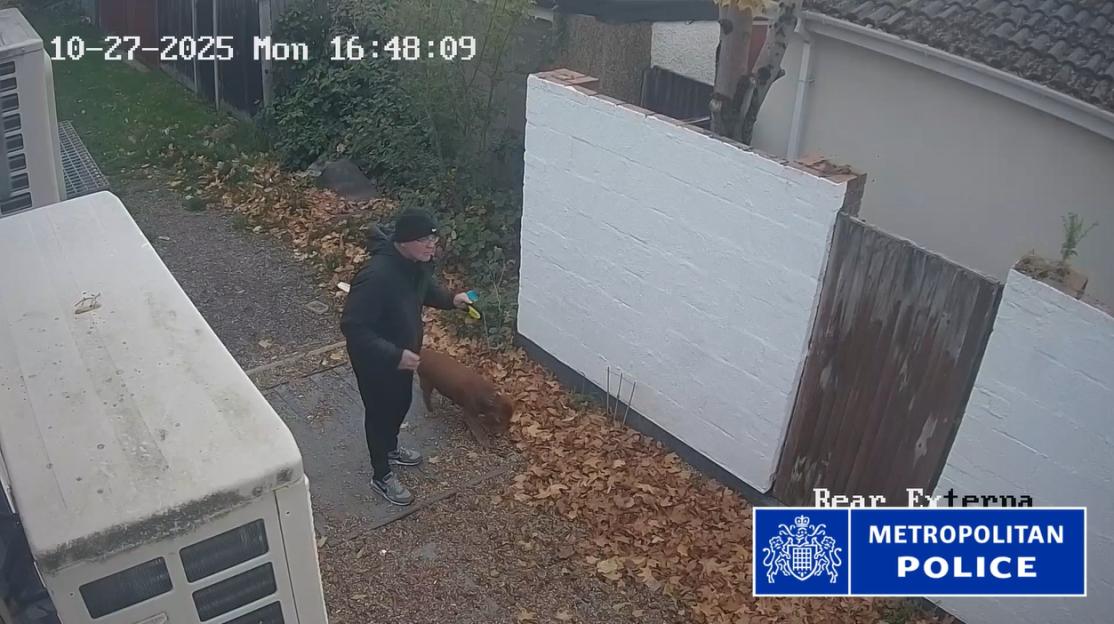 CCTV image of Wayne Broadhurst walking his dog, Harry.