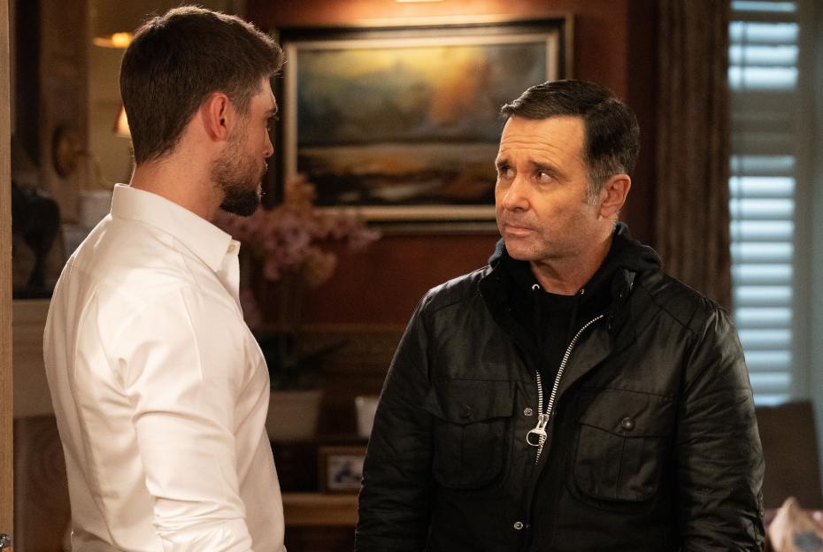 Joe Tate and Graham Foster looking at each other.