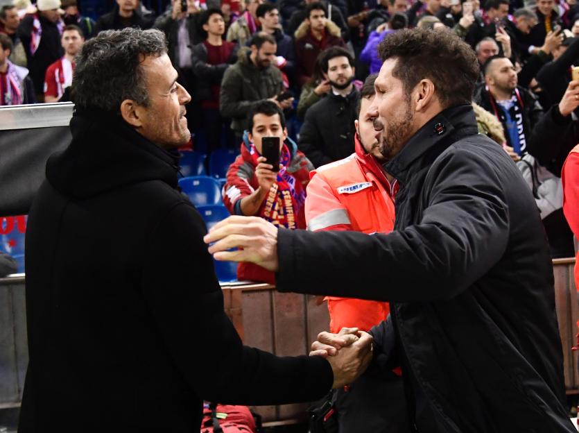 Barcelona's coach Luis Enrique (L) and A