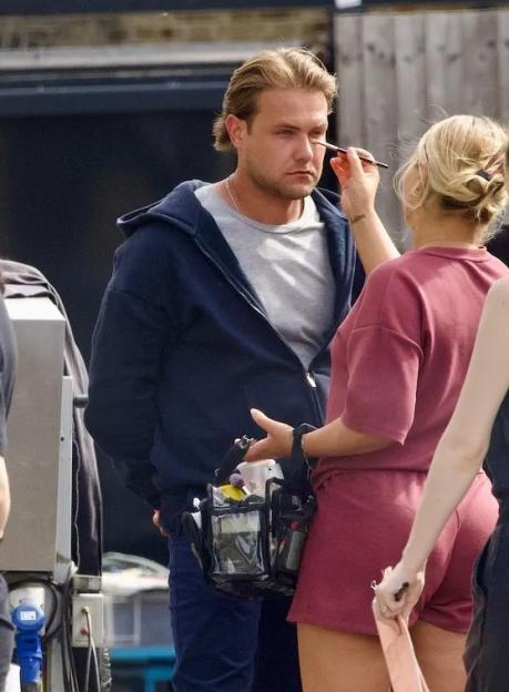 Actors playing Craig Ingram and Amy Mitchell filming EastEnders at Elstree.