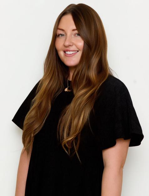 Psychic Chloe Smith holding a crystal ball.