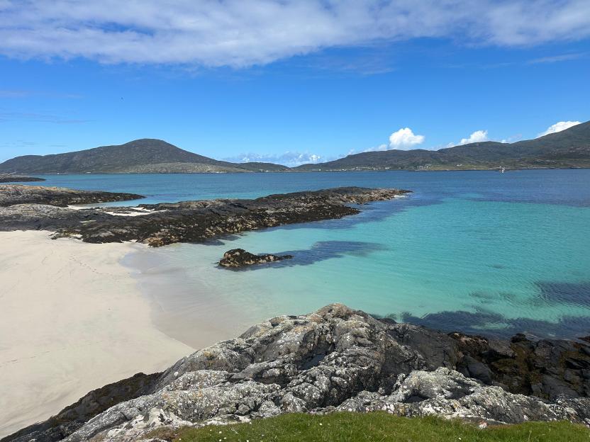 Crystal clear turquoise sea looking over Castlebay.