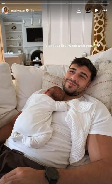 Molly-Mae Hague breastfeeds her newborn son.
