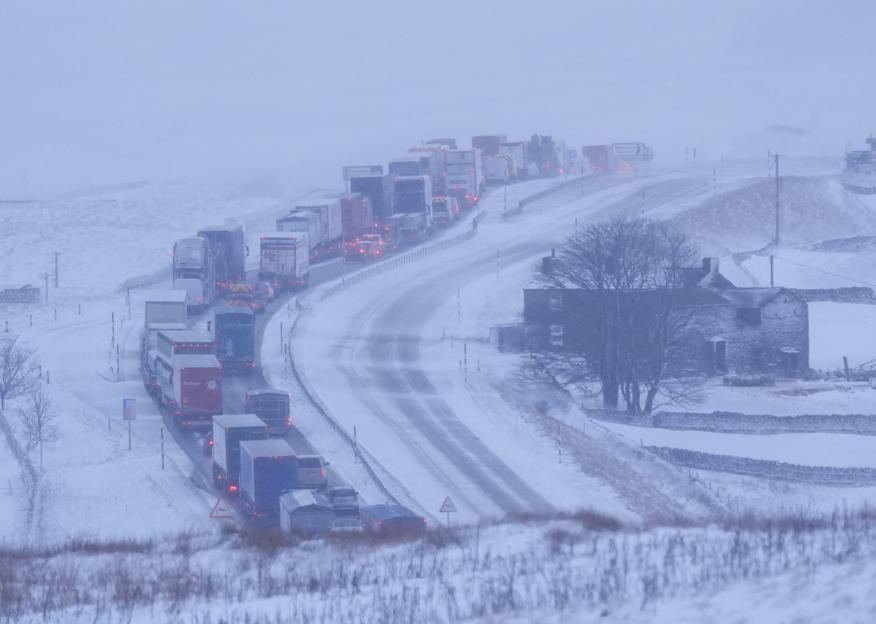 Traffic queues on a snowy A66 in Durham, northeast England.