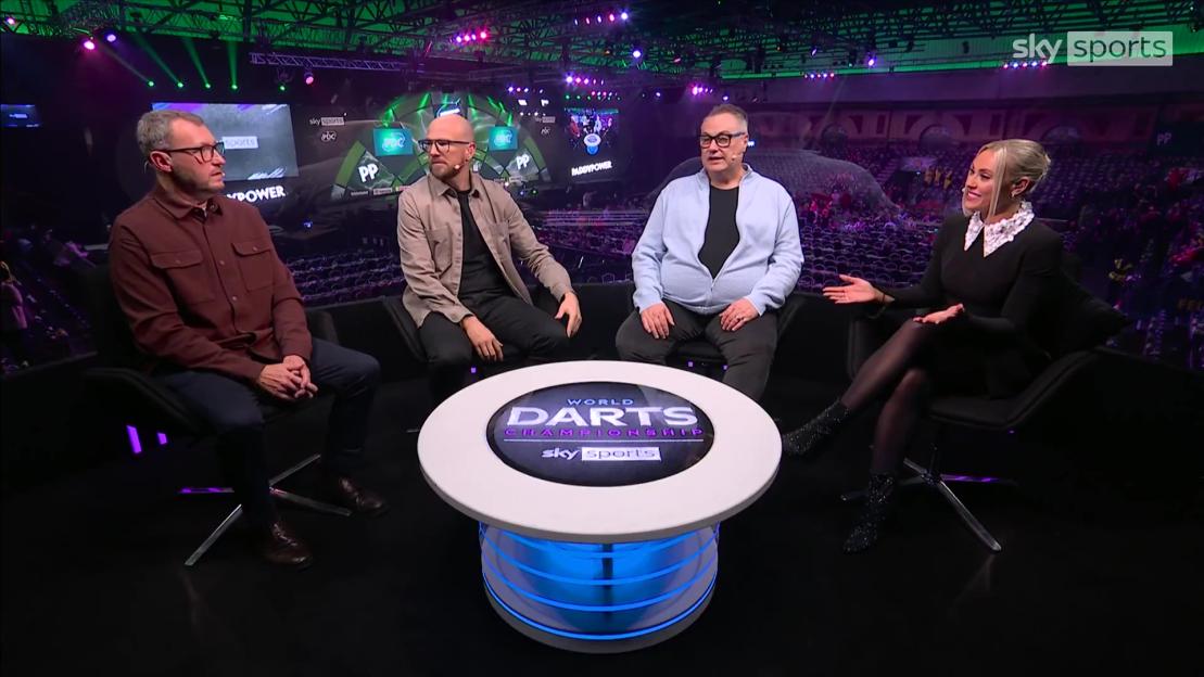 Four people seated at a table featuring "World Darts Championship" and "Sky Sports" logos.