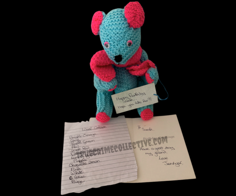 Hand-knitted teddy bear by Rosemary West.