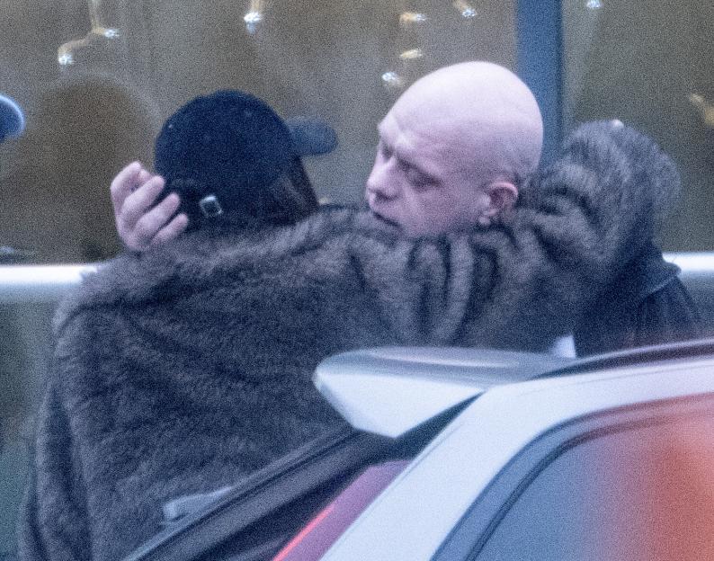 Michael Van Gerwen with a mystery lady resembling his ex, Daphne Govers, leaving a hotel.