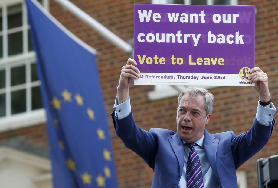 Nigel Farage holding a "Vote to Leave" placard with the EU flag in the background.