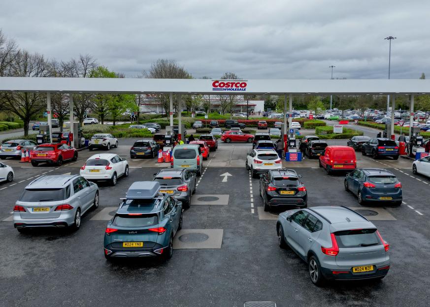 Large queues of cars at a Costco petrol station in Manchester, UK.