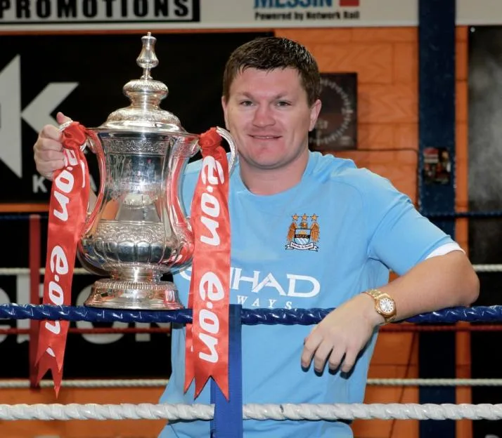 Ricky Hatton, Manchester City fan, holding the FA Cup.
