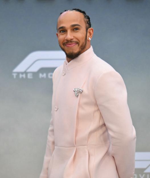 Lewis Hamilton smiles at the premiere of "F1".