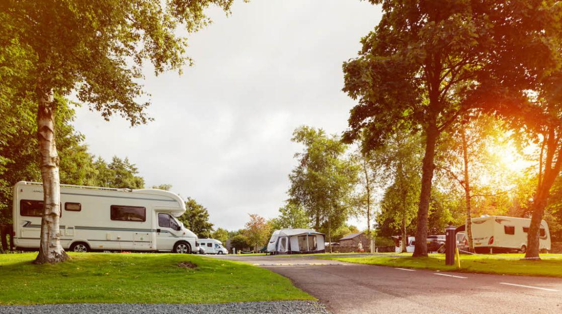 A Hawes Club Campsite with caravans and tents.