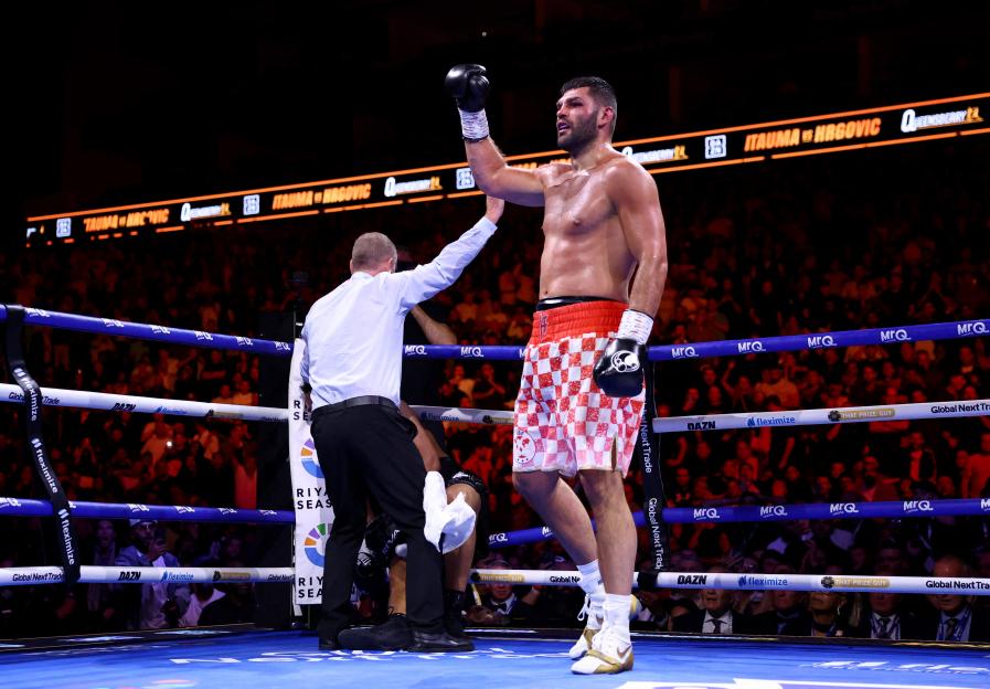 Filip Hrgovic celebrates after winning the IBF World Heavyweight Title.