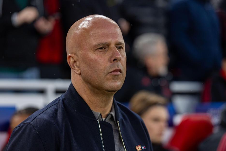 Liverpool FC's head coach Arne Slot reacts during a UEFA Champions League quarterfinal match.