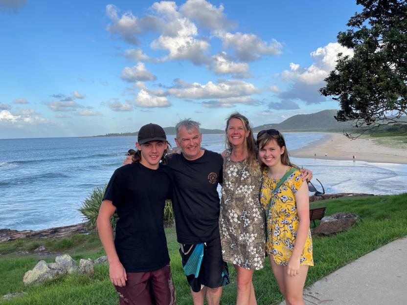 L-R Jeremy Webb, Jonathan Webb, Myfanwy Webb and Kalena Webb smile for a picture with the ocean in the background.