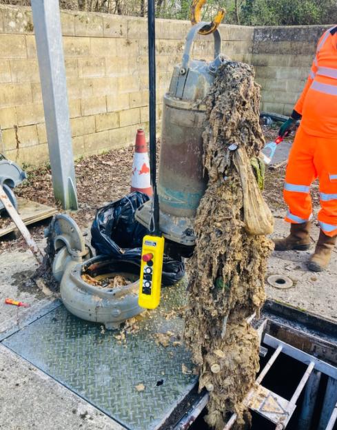 A sewage pump covered in a thick layer of fats, wet wipes, and condoms, retrieved from a blockage in a pumping station.
