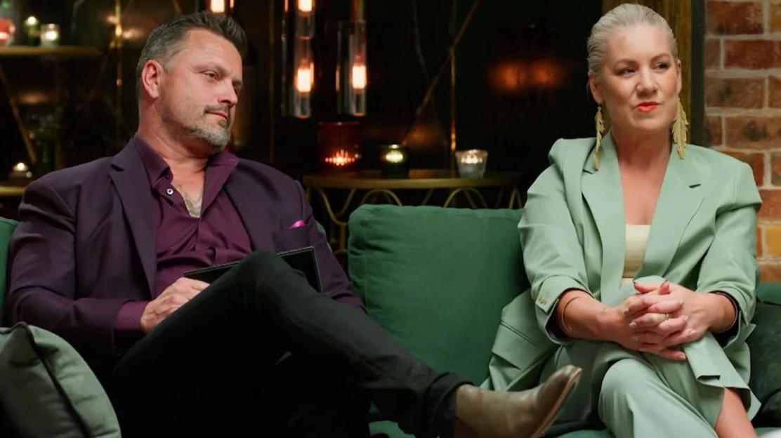 Timothy Smith and Lucinda from MAFS sitting on a couch.