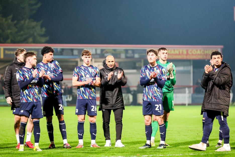 Barrow AFC manager, Dino Maamria and players thank the fans for their support at full-time during the Sky Bet League 2 match between Cheltenham Town and Barrow at the Abbey Business Stadium, Cheltenham on Friday 6th March 2026. (Photo: Stuart Leggett
