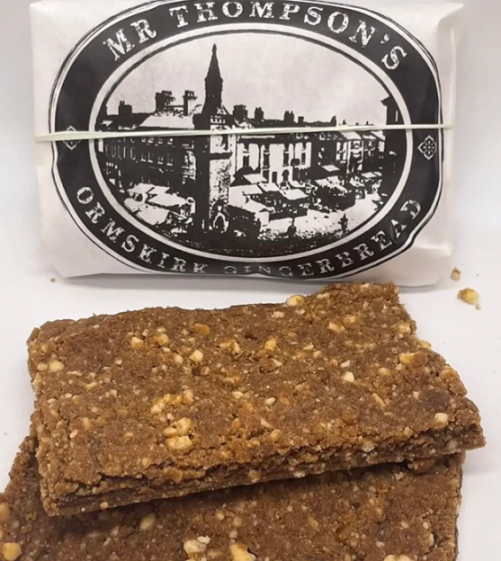 Discover the UK's Enchanting 'Gingerbread Town': A Winter Wonderland of Cozy Pubs and Biscuit Festivals!