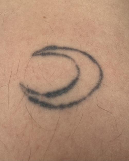 Man raised by serial killer says stepdad forcibly tattooed him aged 13