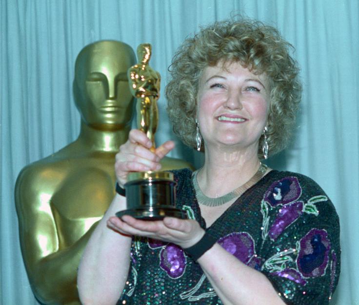 Brenda Fricker holding her Best Supporting Actress Oscar for "My Left Foot" at the 62nd Academy Awards.