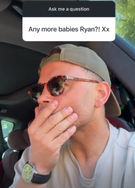 A man named Ryan wearing sunglasses and a cap, covering his mouth as if surprised, with a social media poll overlay asking, "Any more babies Ryan?! Xx".