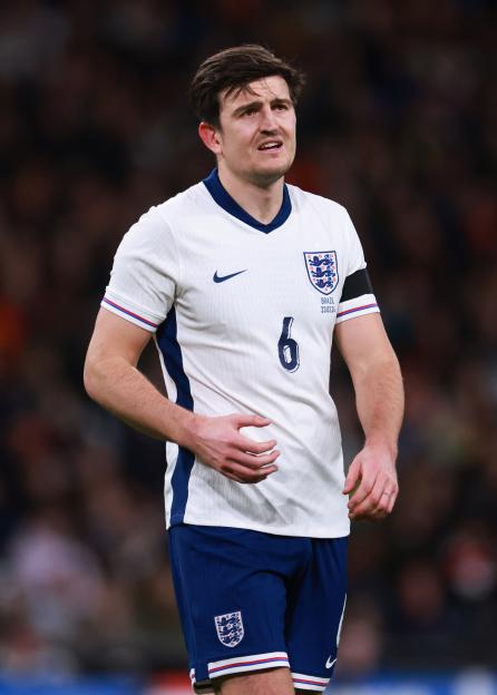 Harry Maguire playing for England at Wembley Stadium.