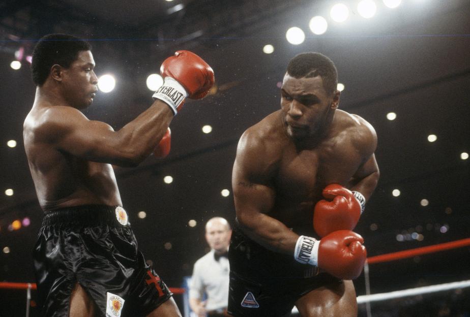 Mike Tyson and Trevor Berbick boxing for the WBC Heavyweight title.