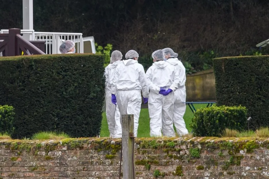 Police search team and forensic investigators search for evidence at Phyllis Court in Henley-on-Thames.