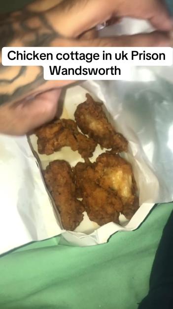 Fried chicken in a white container in HMP Wandsworth.