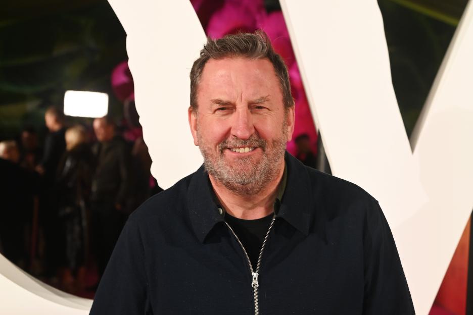 Lee Mack smiling at the premiere performance of Cirque du Soleil's "OVO".