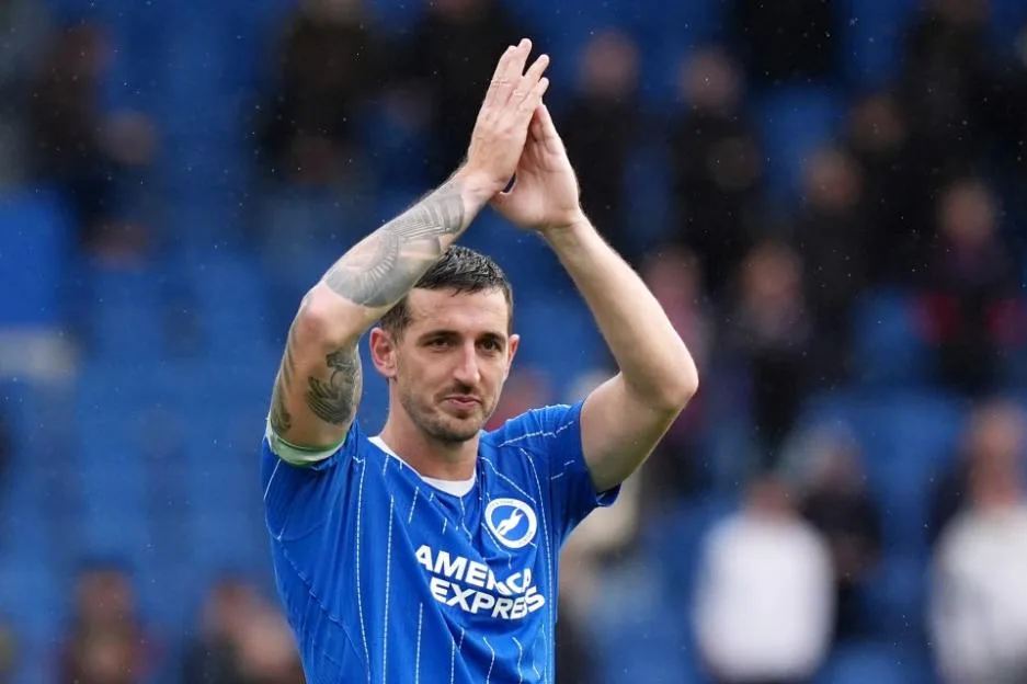 Brighton and Hove Albion's Lewis Dunk celebrates after a Premier League match.