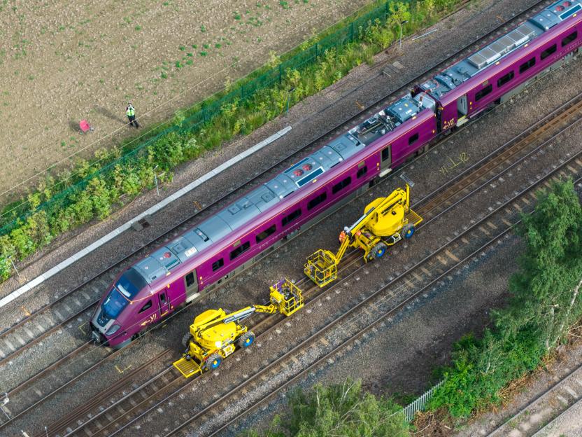 Dramatic new aerial photos show the severely buckled crash train in Bedford