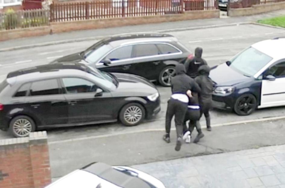 Moment man is kidnapped from house while woman screams 'let him go'