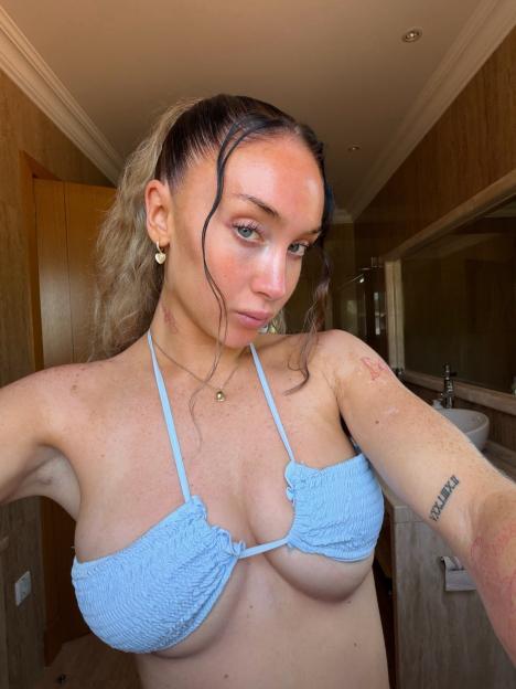 Paul Scholes' Daughter Turns Heads in Tiny Bikini with Bold Underboob Reveal