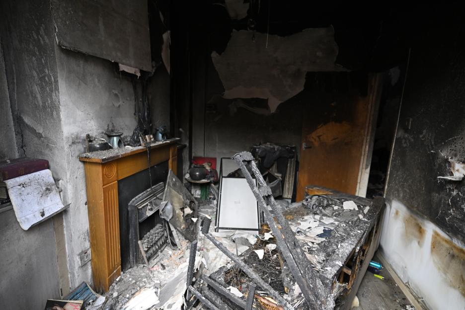 The burnt interior of a home in Belfast following anti-immigrant riots.