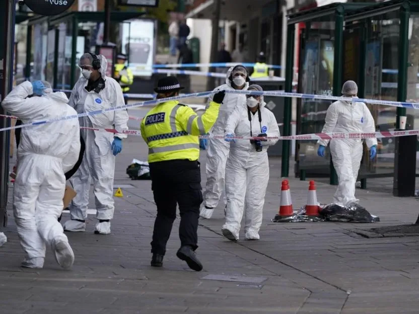 Forensic investigators examine scene after police officer shot in Nottingham