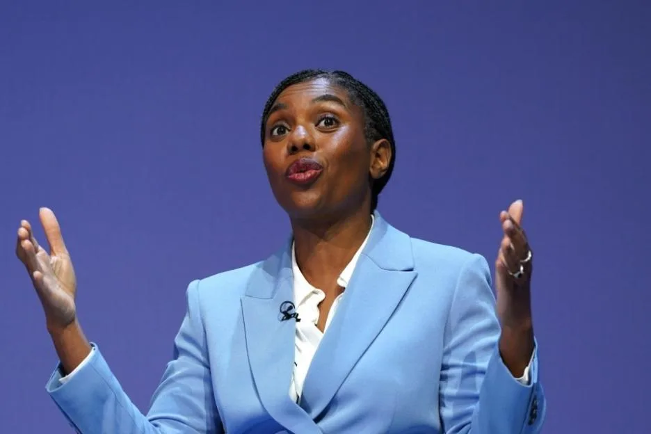 Kemi Badenoch speaks on stage at the Conservative Party Conference.