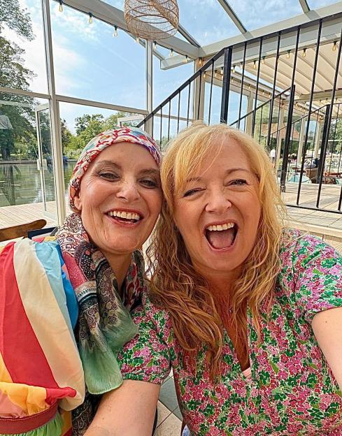 Tracy Shaw and another woman smiling at an outing.