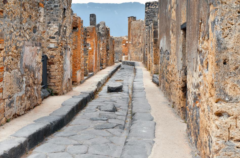 Street and ruined houses in the Old Roman city of Pompeii (Pompei, Campania, italy)