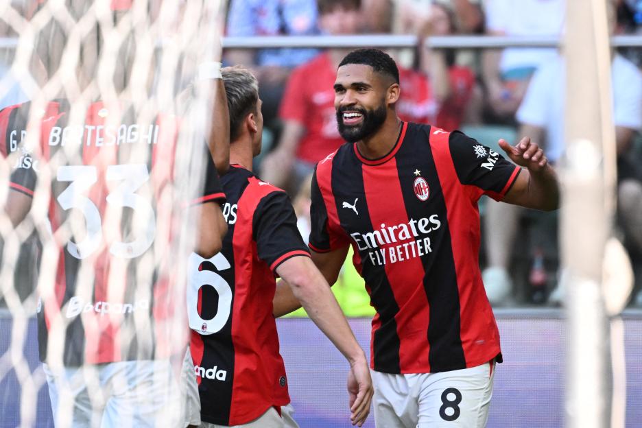 Ruben Loftus-Cheek celebrates with teammates after scoring a goal.