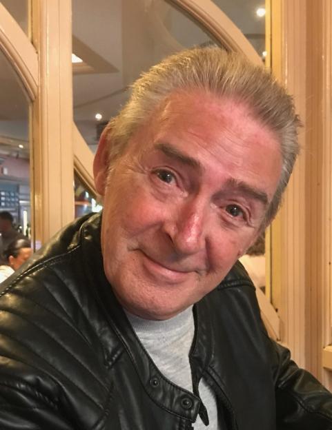 Family Pays Tribute to 75-Year-Old Grandad Found Dead in Flats as 49-Year-Old Woman Charged with Murder