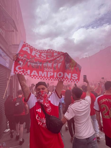 'Can You Guess the Celebrity Sneaking into Arsenal's Premier League Bus Parade in Disguise?'