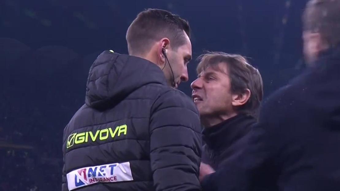 Two men in a heated argument, one wearing a GIVOVA branded jacket.
