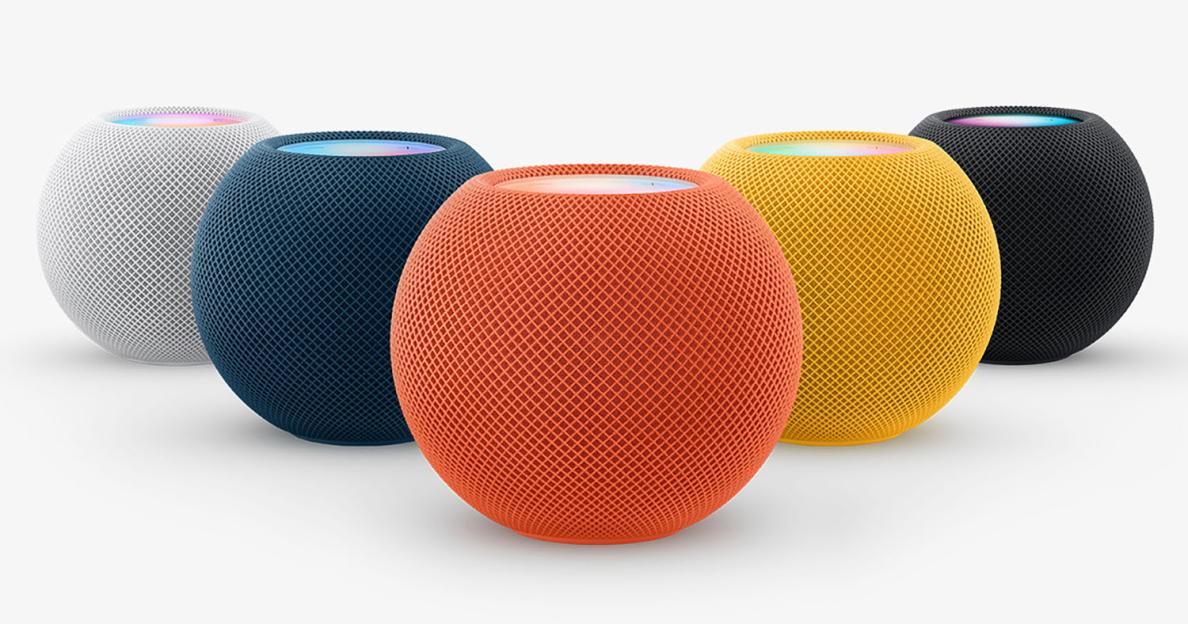 Five Apple HomePods in white, blue, orange, yellow, and black.