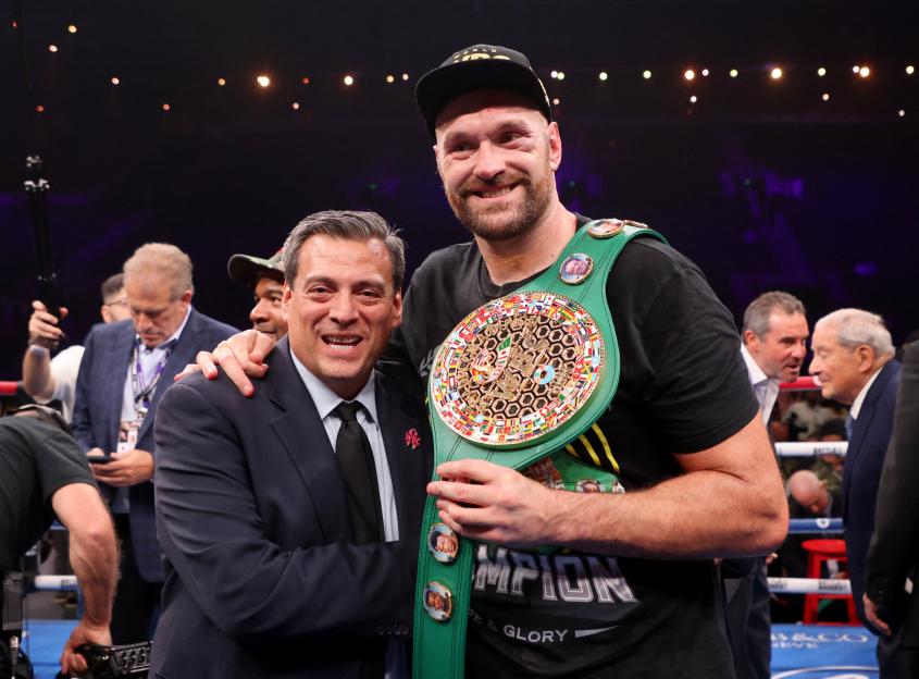 Tyson Fury poses with his WBC Heavyweight Title belt alongside WBC President Mauricio Sulaiman.
