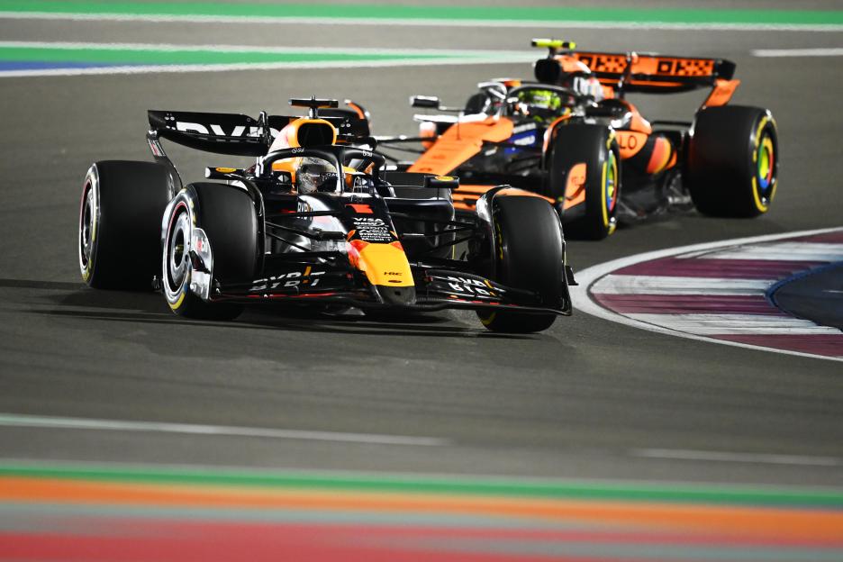 Max Verstappen's Red Bull Racing RB20 leads Lando Norris's McLaren MCL38 Mercedes during the F1 Grand Prix of Qatar.