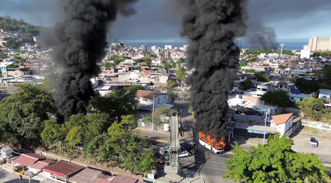 Smoke billows, following a military operation in which a government source said Mexican drug lord Nemesio Oseguera, known as "El Mencho," was killed, in Puerto Vallarta